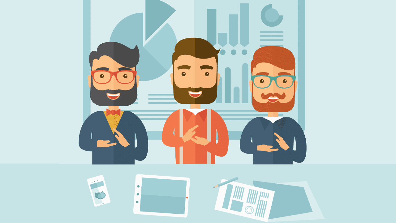 Three smiling men are standing at a table, showcasing teamwork and collaboration. Behind them is a wall with graphs and data charts, representing a professional environment focused on engineering and technical writing. Tablets and documents are visible on the table.