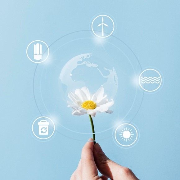 A hand holding a flower with icons representing sustainable energy, recycling, water, and sunlight in the background. The image symbolizes the connection between nature and innovative Cleantech solutions.